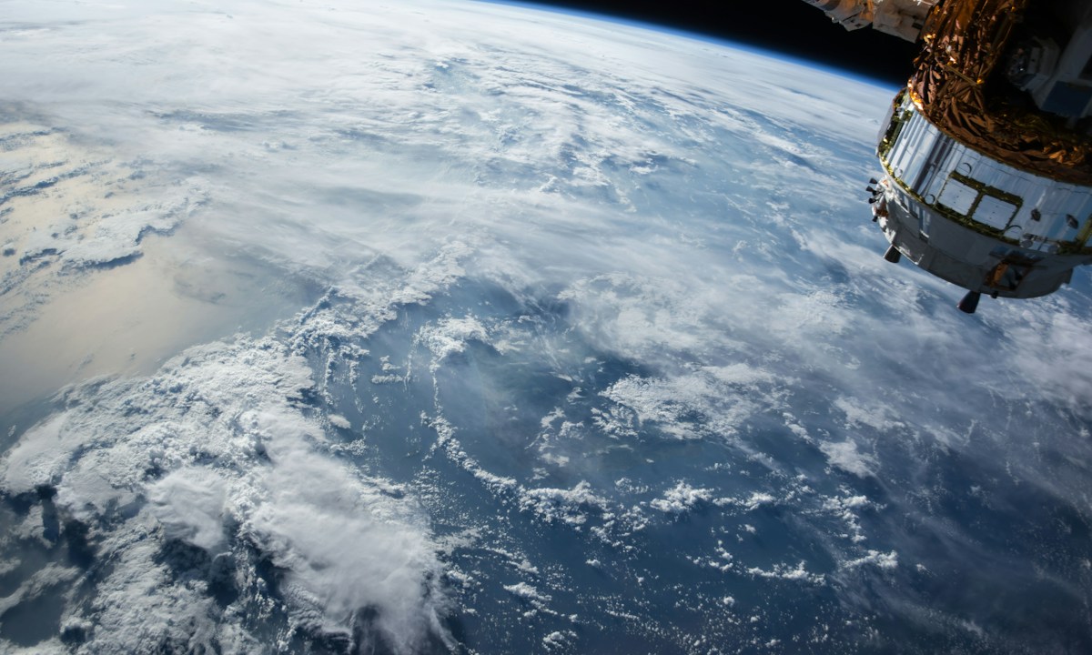 Earth and spacecraft viewed from orbit